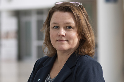 Portrait of a woman in an indoors environment. Photo