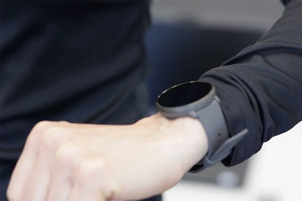 Arm med digital klocka