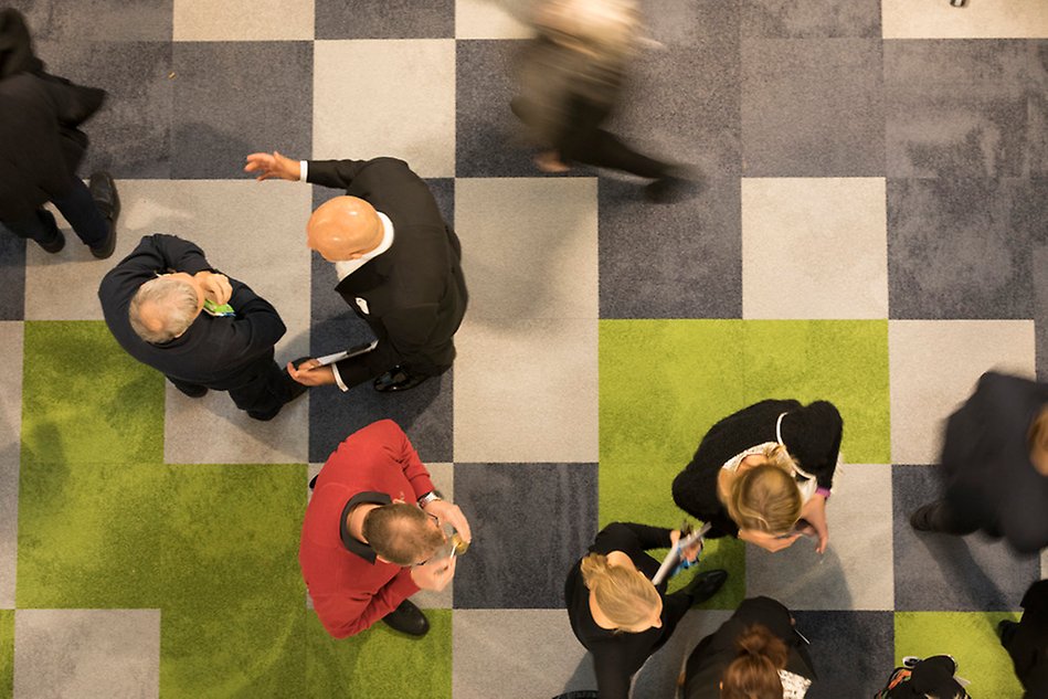 A gathering of people photographed from above.