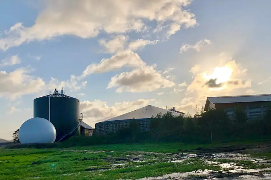 Three silos in sundown. Photo.