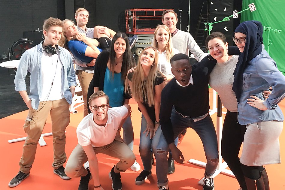 Student and models during the filming of the Halmstad University promotion in 2018. Photo.