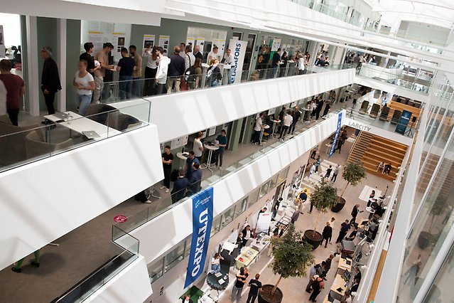 The S building filled with visitors and participants at Utexpo.