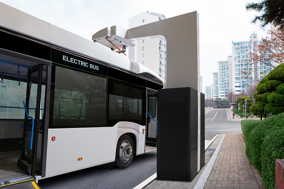 Electric bus at a charging station. Photo.