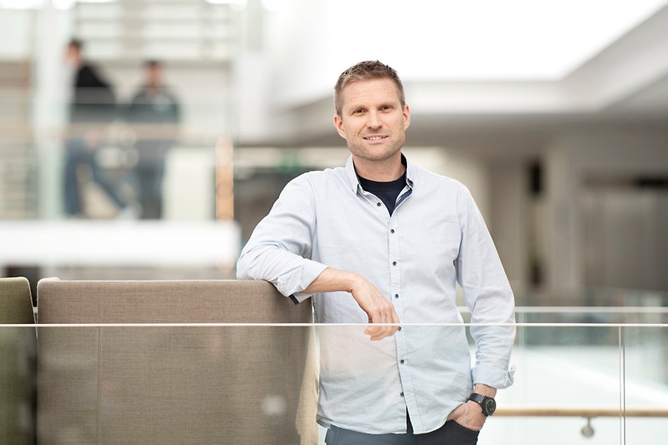 A portrait of a man wearing a shirt.