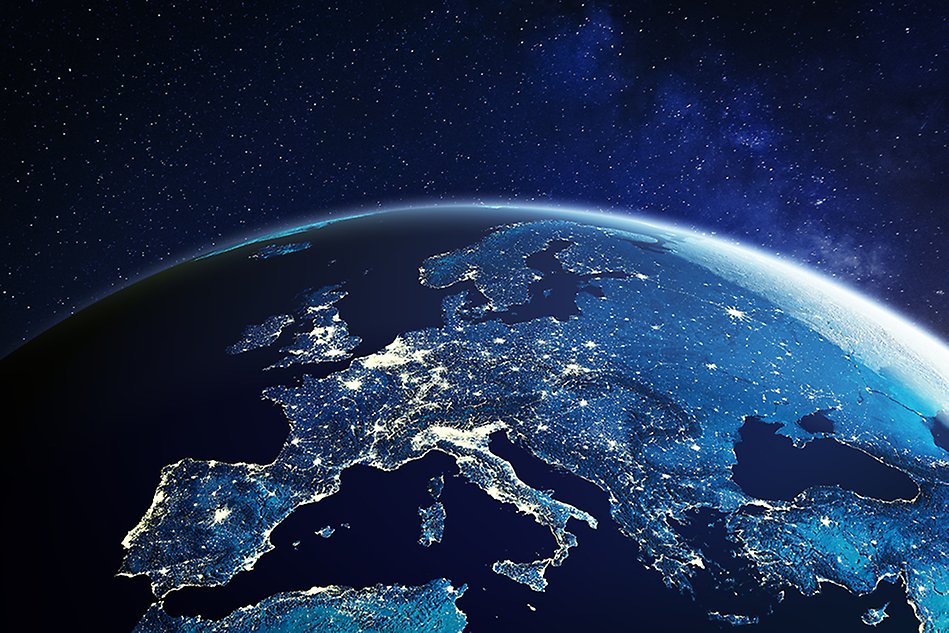 Europe from space at night with city lights showing European cities.