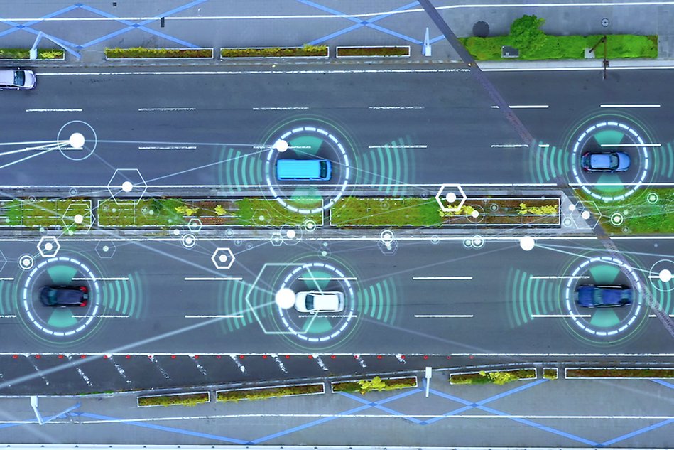 Cars on a road with graphic blue signals to illustrate that they communicate. Illustration