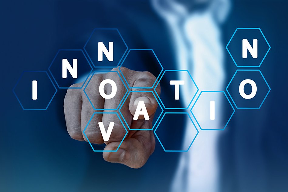A finger pointing at the text "innovation".
