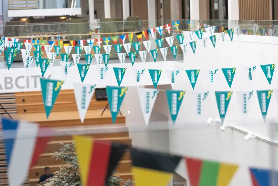 Pennants with flags of countries, and pennants with the text Heroes.