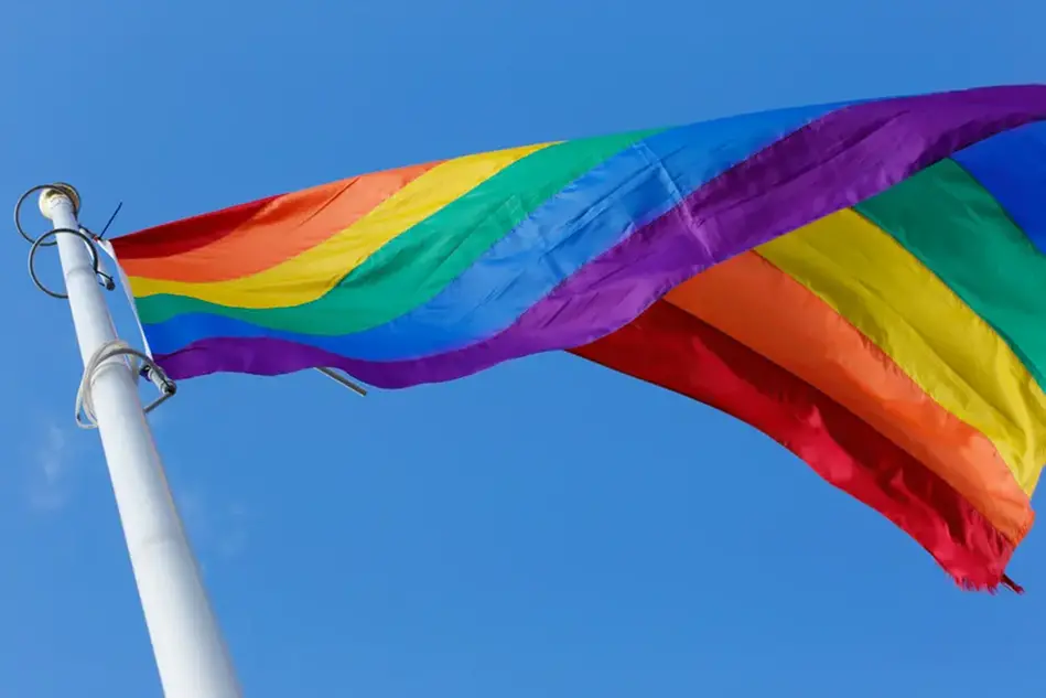 Pride flag blowing in the wind