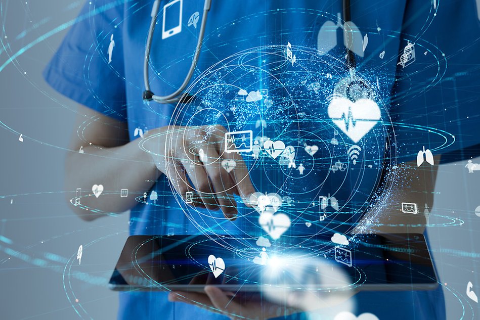A person stands behind digital health relaterad icons.